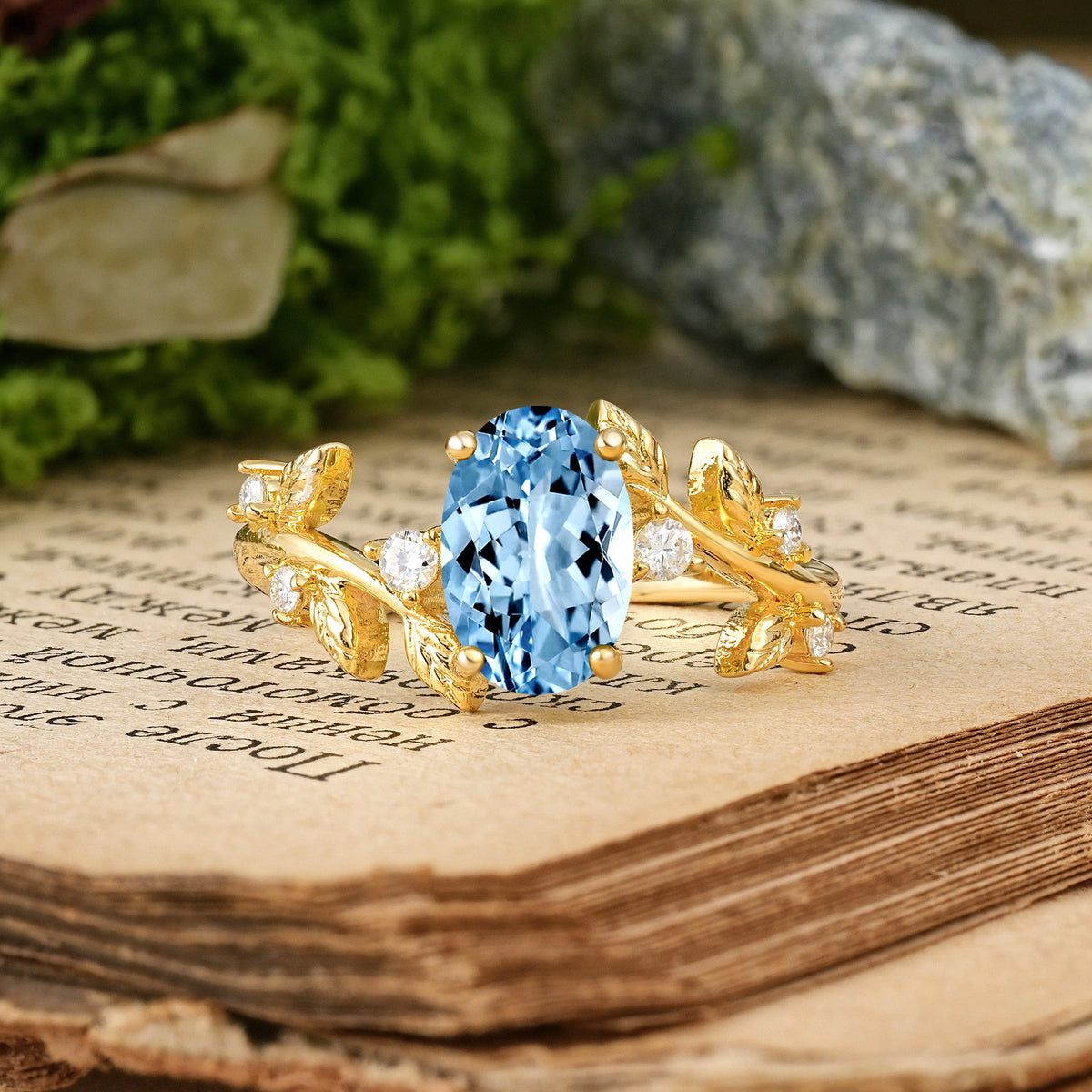 Oval Cut Aquamarine Nature Inspired Four Prong Leaf Vine Accent Engagement Ring