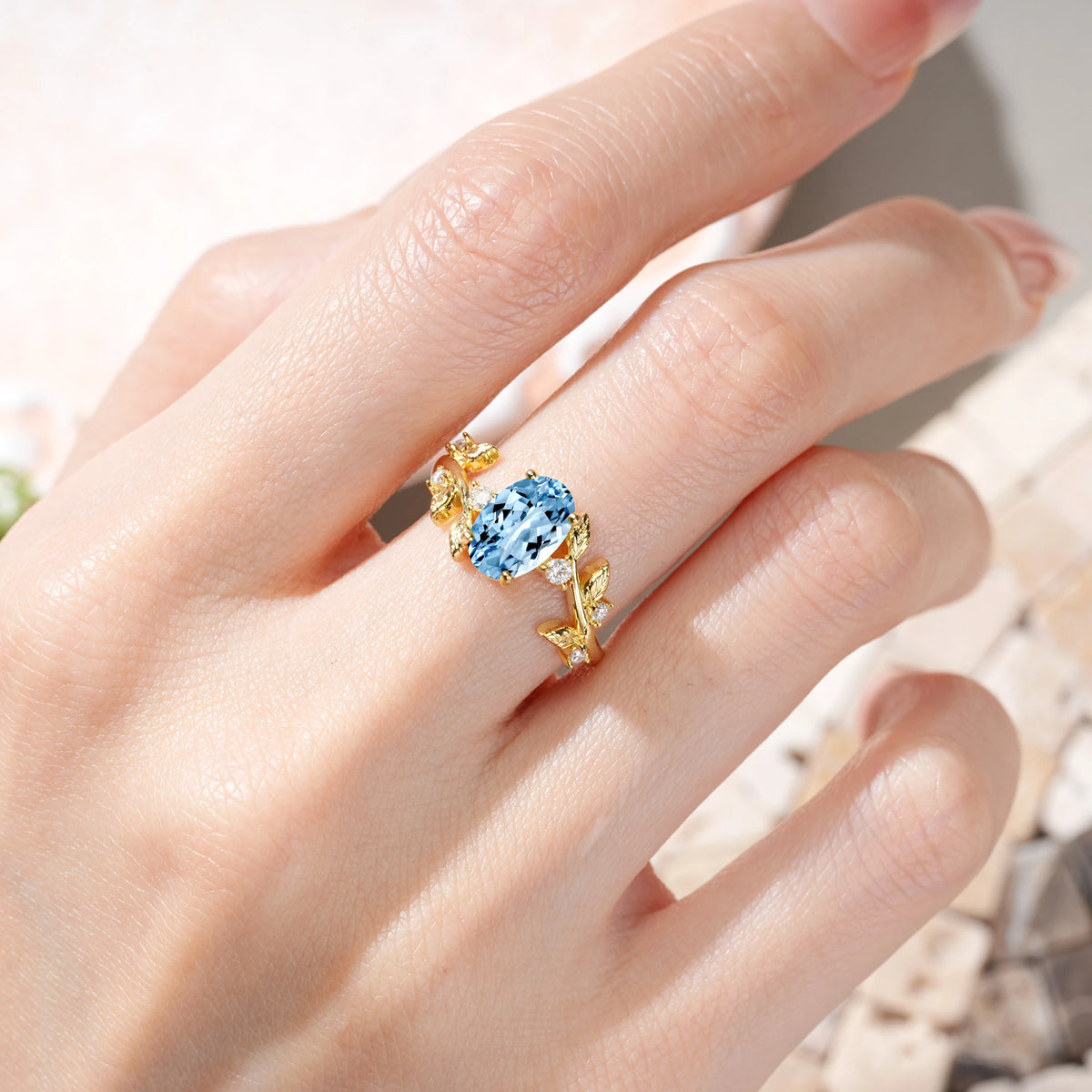Oval Cut Aquamarine Nature Inspired Four Prong Leaf Vine Accent Engagement Ring