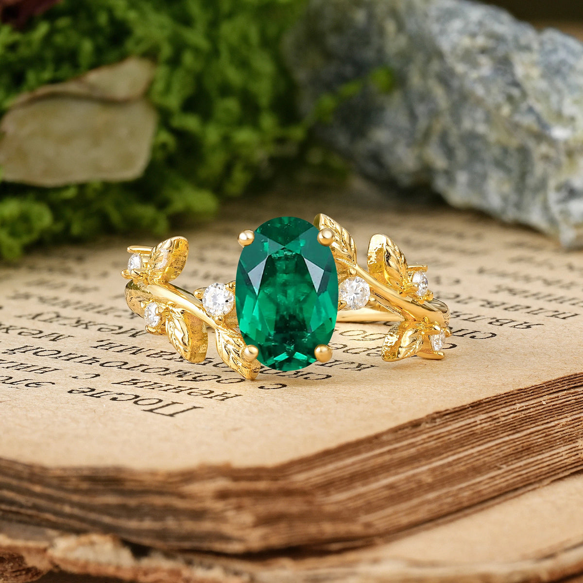 Oval Cut Emerald Nature Inspired Four Prong Leaf Vine Accent Engagement Ring