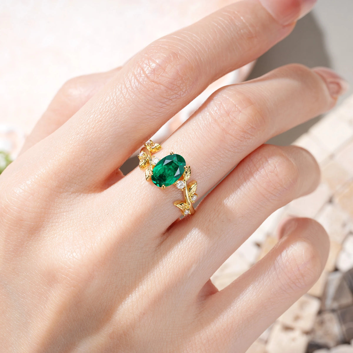 Oval Cut Emerald Nature Inspired Four Prong Leaf Vine Accent Engagement Ring