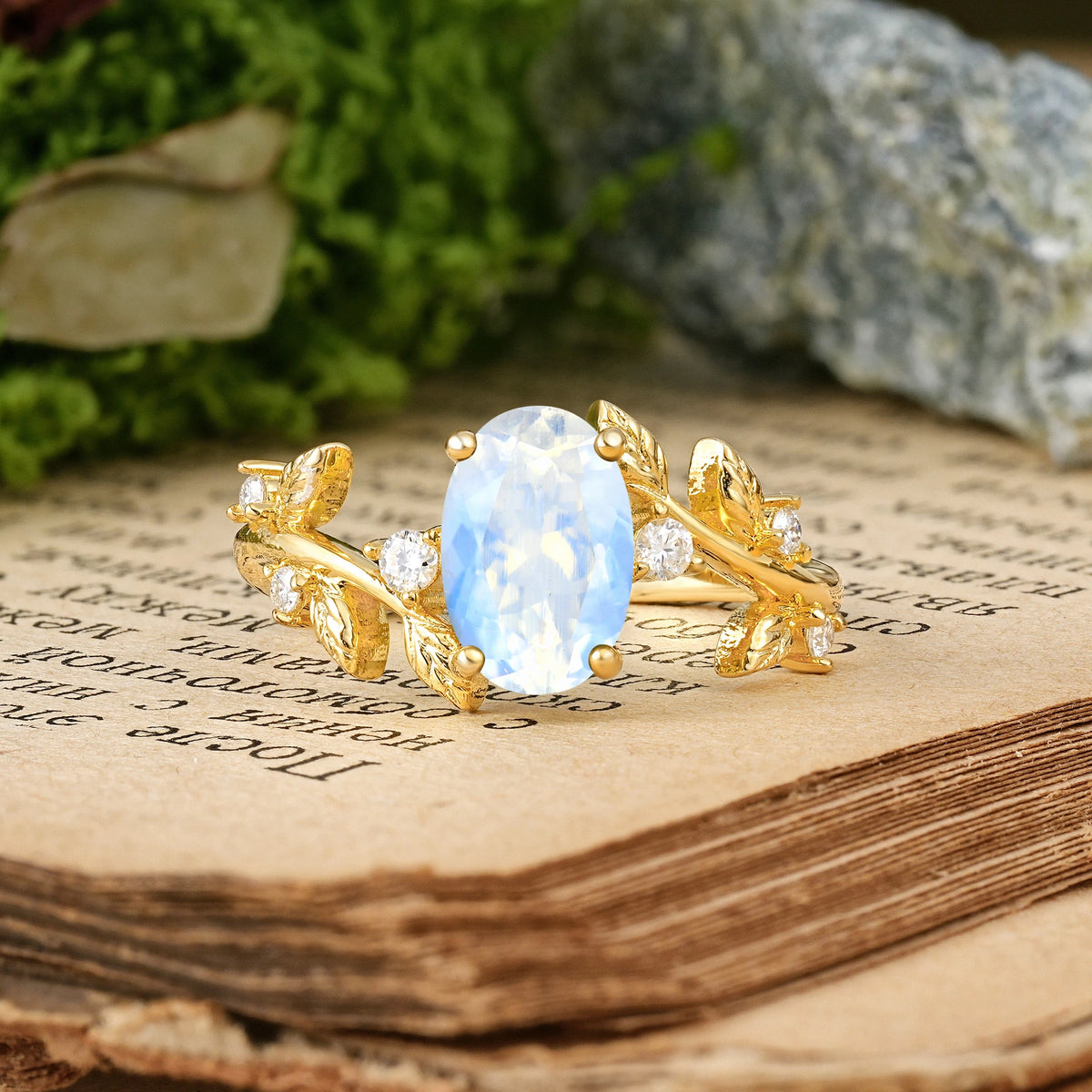 Oval Cut Moonstone Nature Inspired Four Prong Leaf Vine Accent Engagement Ring