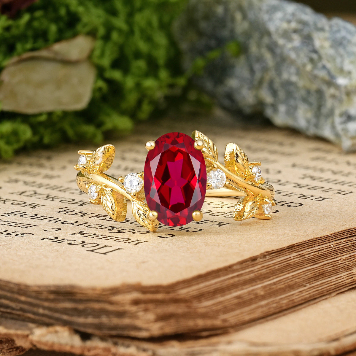 Oval Cut Ruby Nature Inspired Four Prong Leaf Vine Accent Engagement Ring