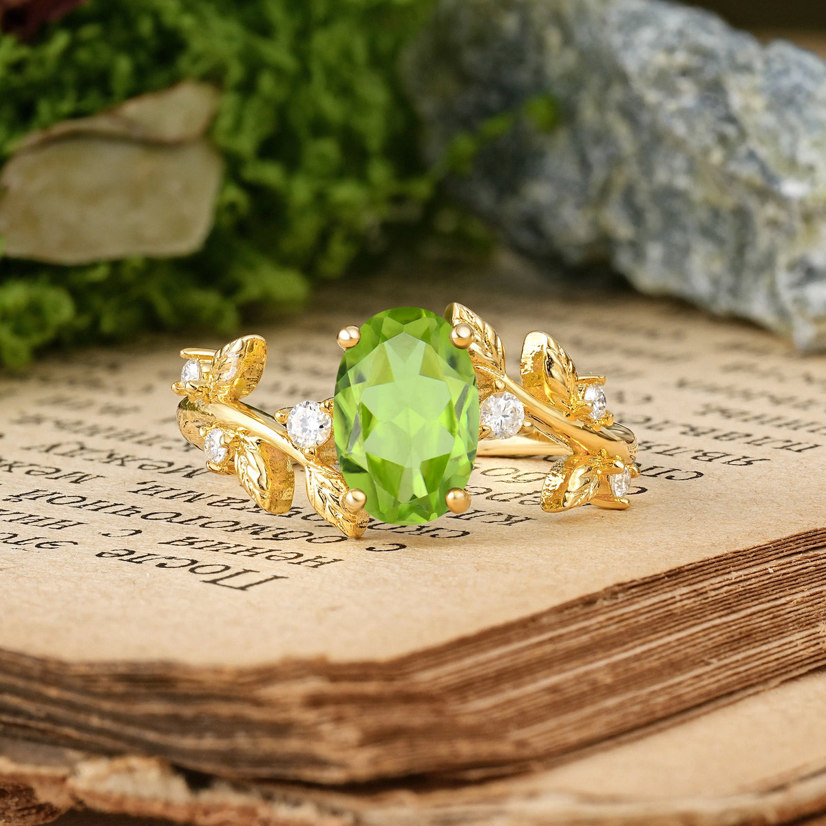 Oval Cut Peridot Nature Inspired Four Prong Leaf Vine Accent Engagement Ring