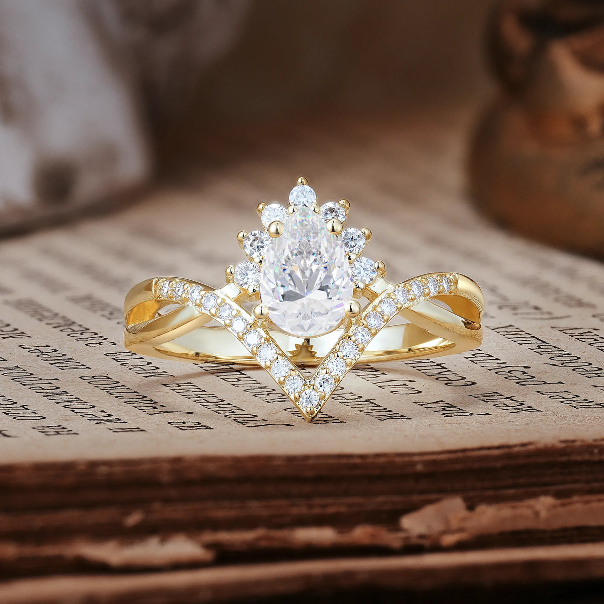 Princess Crown Pear Cut Halo V Shaped Twisted Pavé Shank Moissanite Engagement Ring