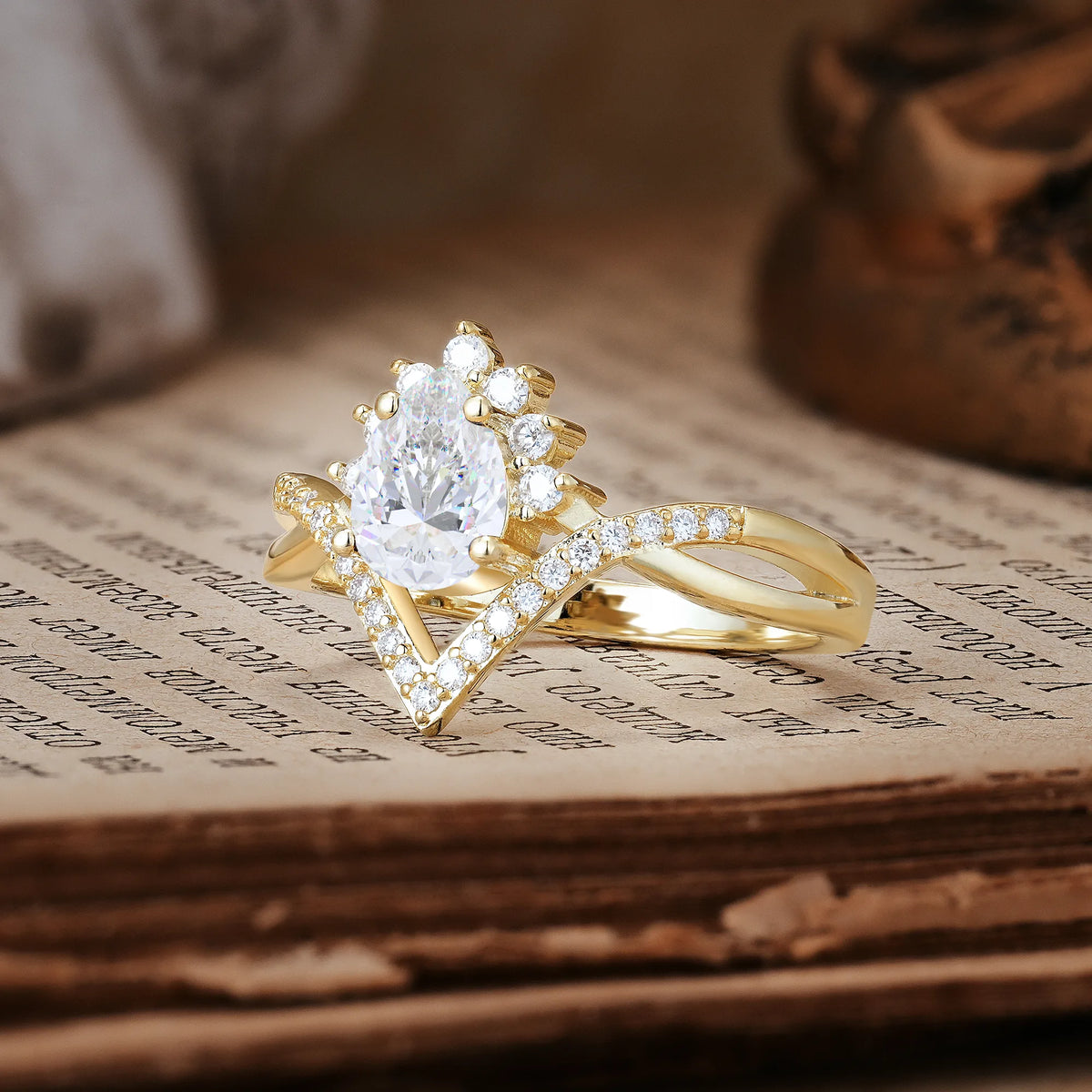 Princess Crown Pear Cut Halo V Shaped Twisted Pavé Shank Moissanite Engagement Ring