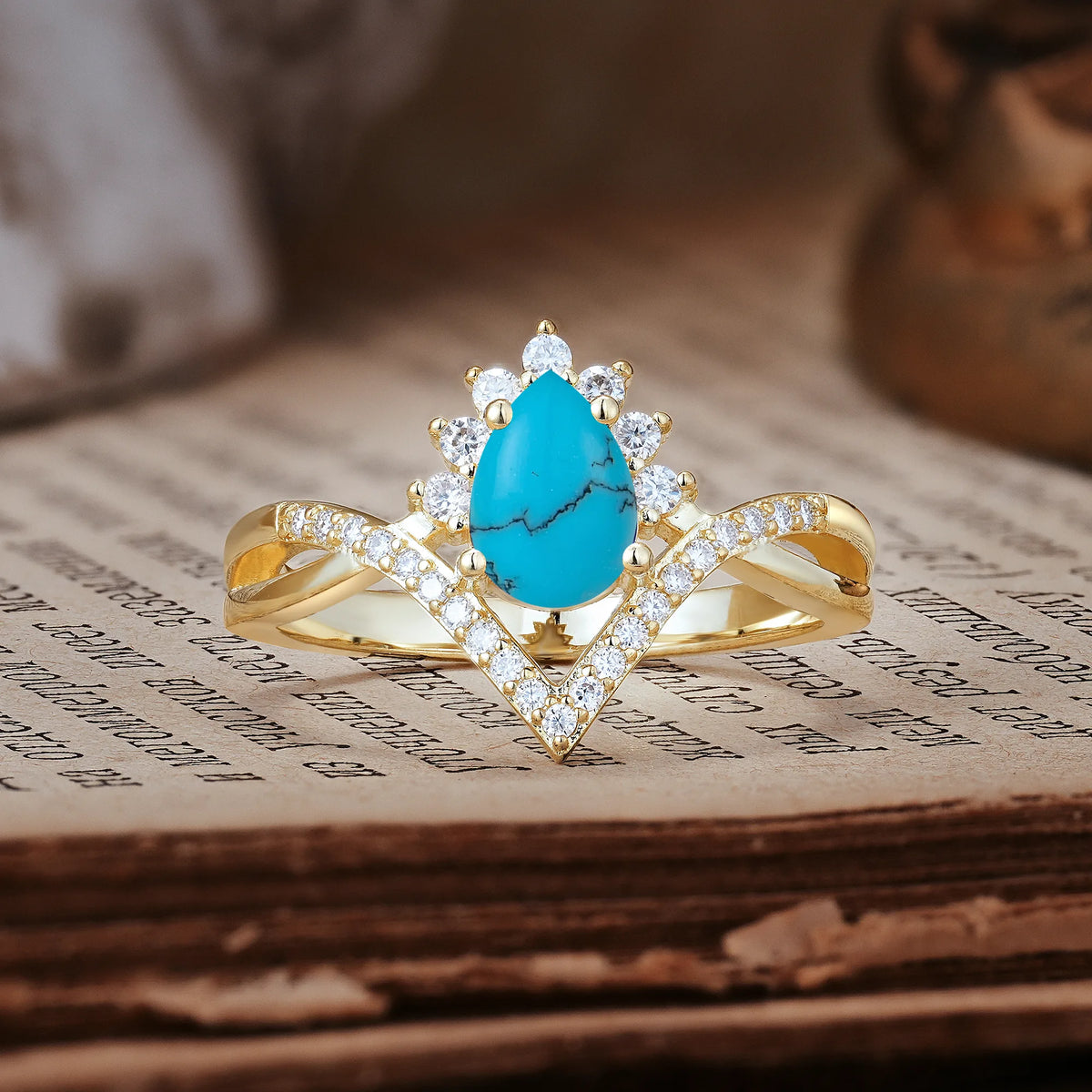 Princess Crown Pear Cut Halo V Shaped Twisted Pavé Shank Turquoise Engagement Ring
