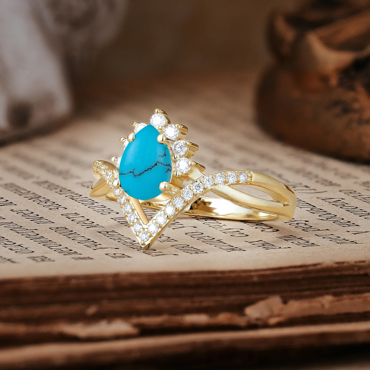 Princess Crown Pear Cut Halo V Shaped Twisted Pavé Shank Turquoise Engagement Ring