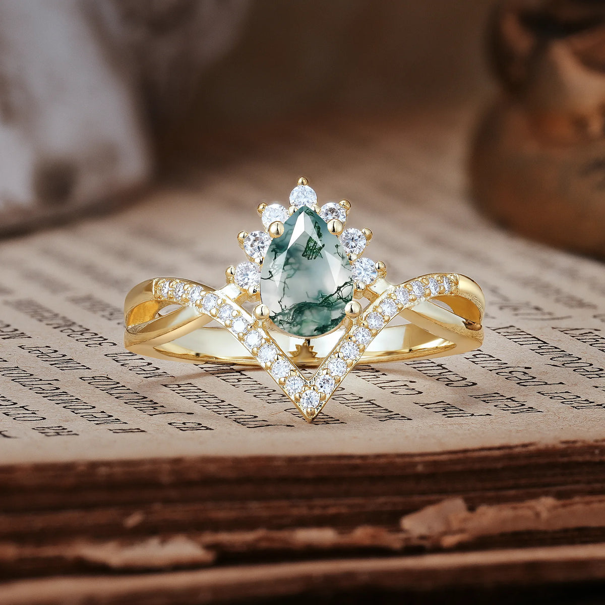 Princess Crown Pear Cut Halo V Shaped Twisted Pavé Shank Moss Agate Engagement Ring