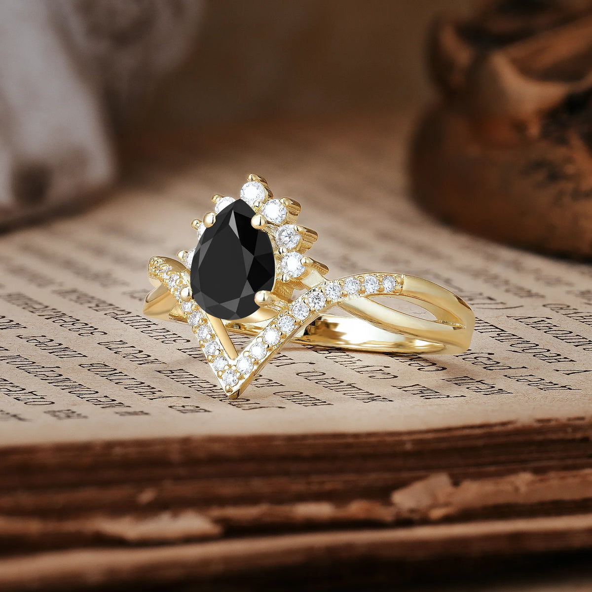 Princess Crown Pear Cut Halo V Shaped Twisted Pavé Shank Black Onyx Engagement Ring