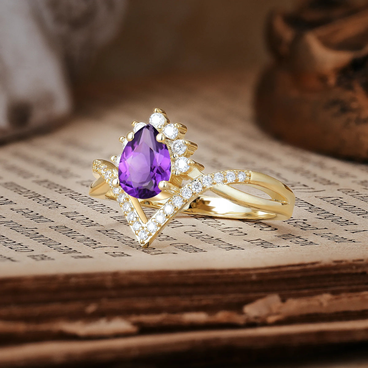 Princess Crown Pear Cut Halo V Shaped Twisted Pavé Shank Amethyst Engagement Ring