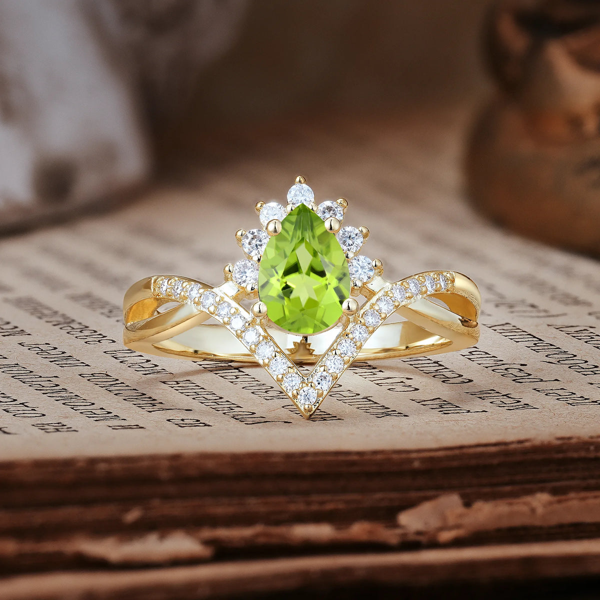 Princess Crown Pear Cut Halo V Shaped Twisted Pavé Shank Peridot Engagement Ring
