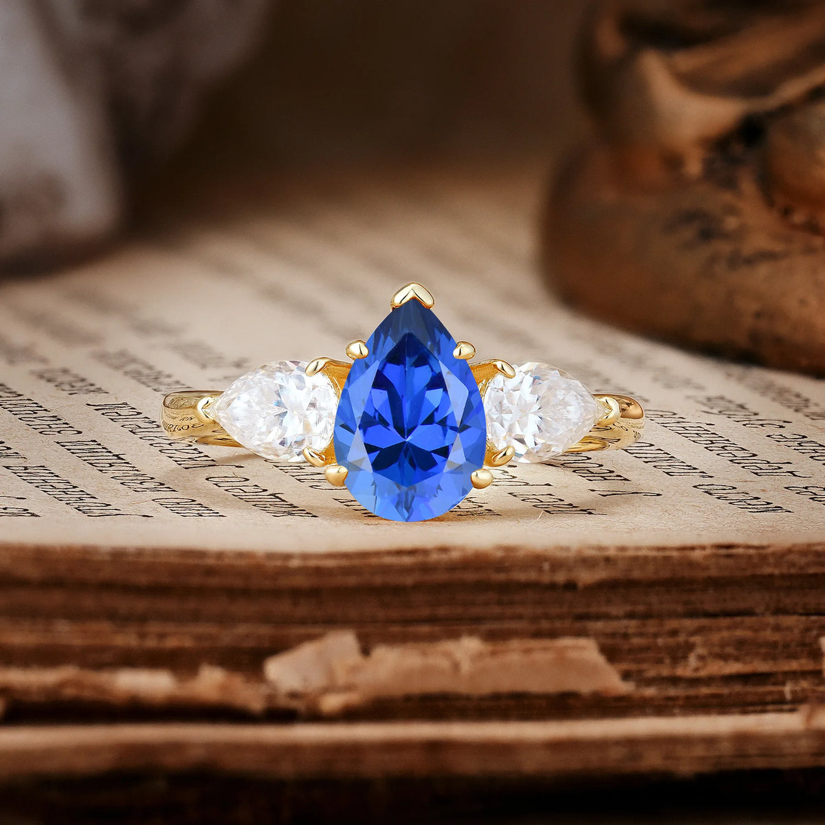 Classic, Luxurious 5-Prong Pear Cut Sapphire Three-Stone Engagement Ring