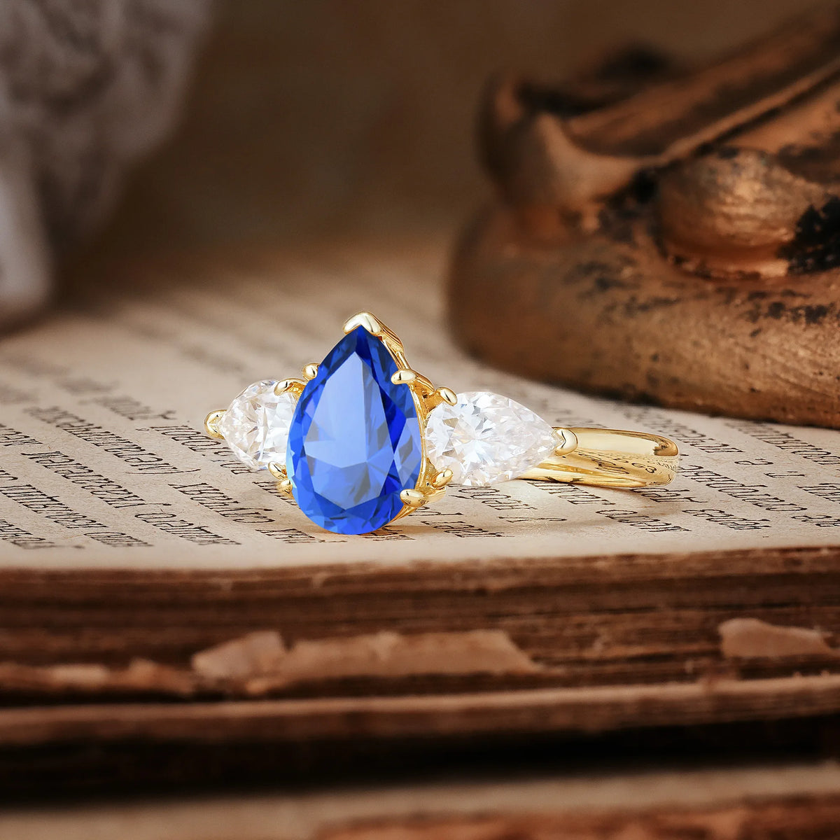 Classic, Luxurious 5-Prong Pear Cut Sapphire Three-Stone Engagement Ring