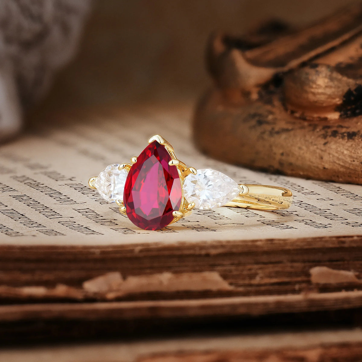 Classic, Luxurious 5-Prong Pear Cut Ruby Three-Stone Engagement Ring