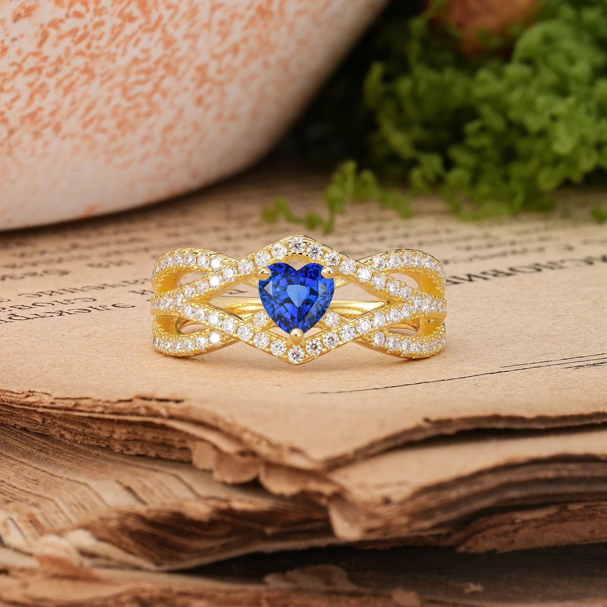Heart-Cut Sapphire Unique Pavé Setting Surrounding a 3-Prong Engagement Ring