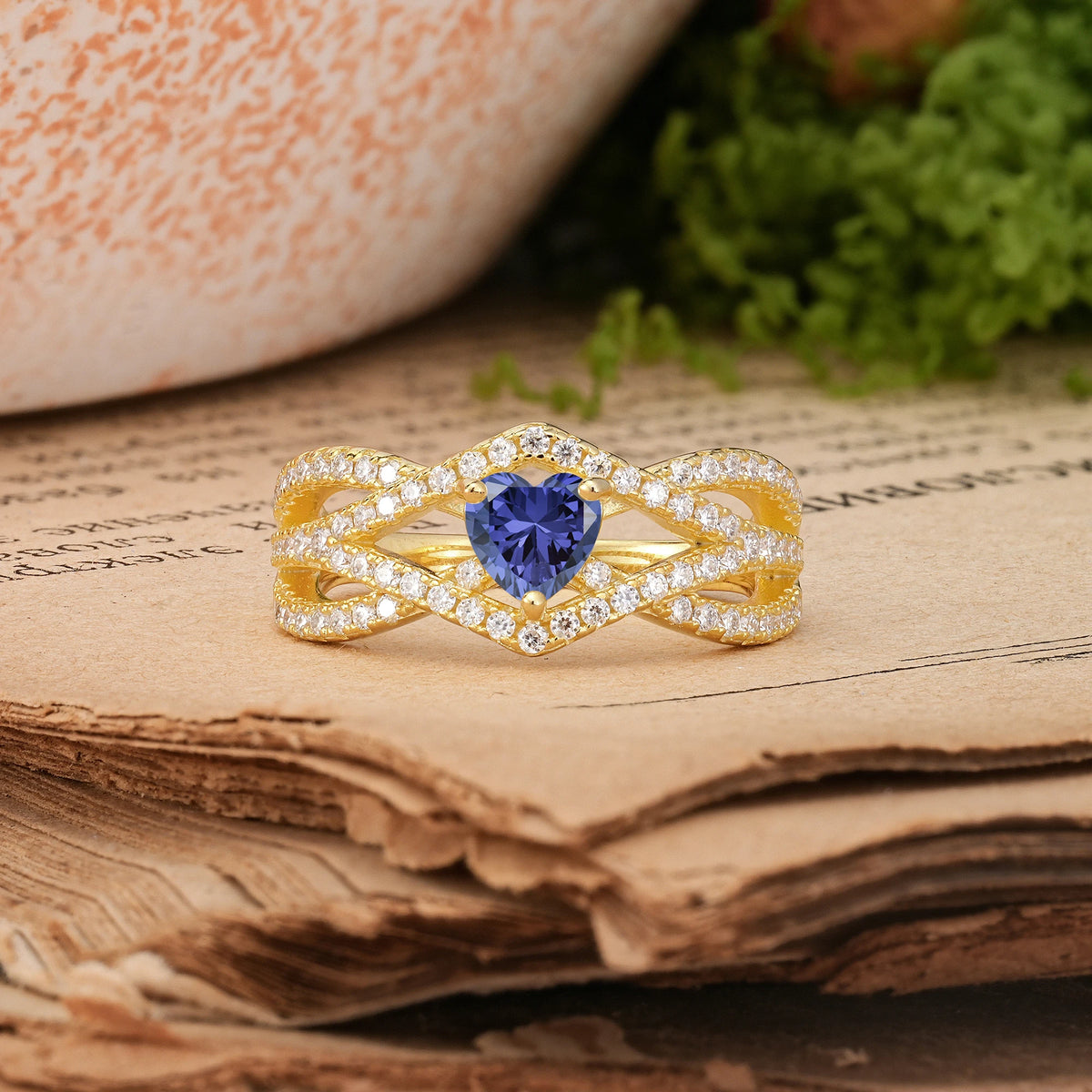Heart-Cut Tanzanite Unique Pavé Setting Surrounding a 3-Prong Engagement Ring