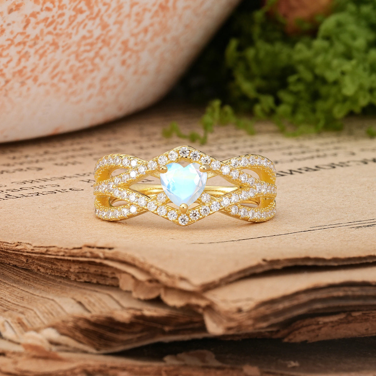 Heart-Cut Moonstone Unique Pavé Setting Surrounding a 3-Prong Engagement Ring