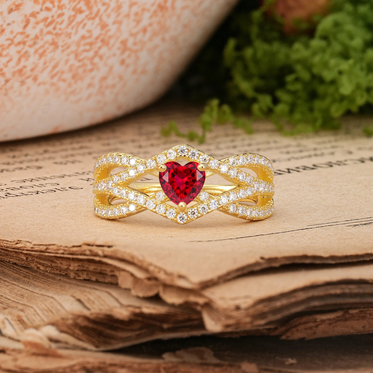 Heart-Cut Ruby Unique Pavé Setting Surrounding a 3-Prong Engagement Ring