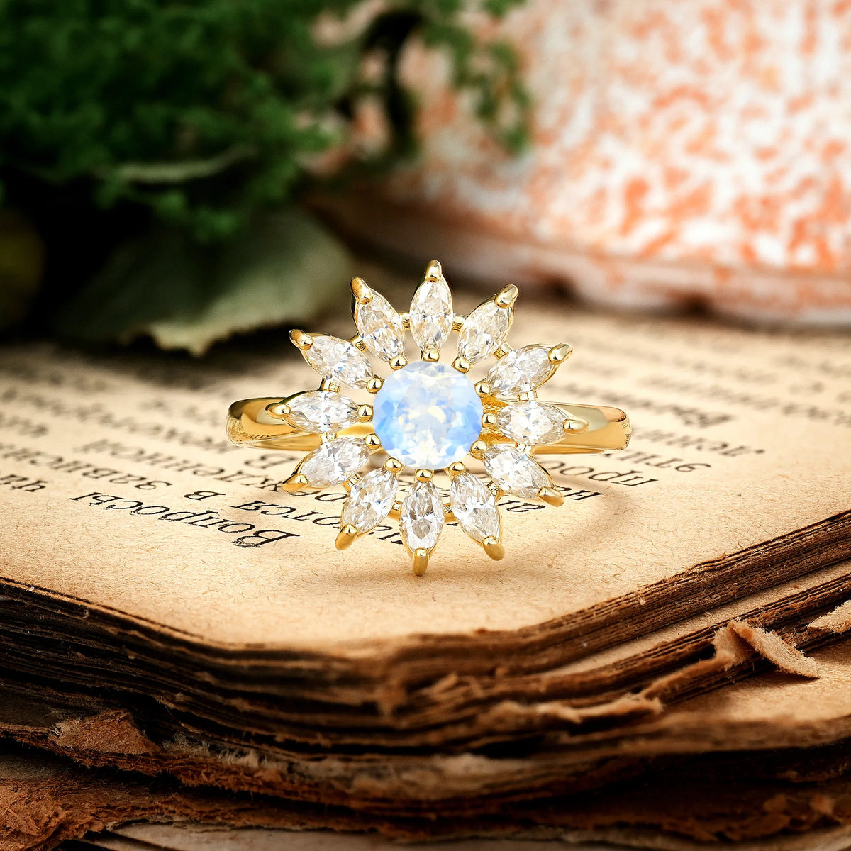 Luxurious Classic Flower-Shaped 12-Prong Round Cut Moonstone Engagement Ring