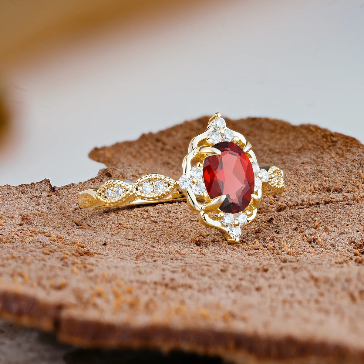 Luxurious Vintage 4-Prong Oval Cut Garnet Engagement Ring