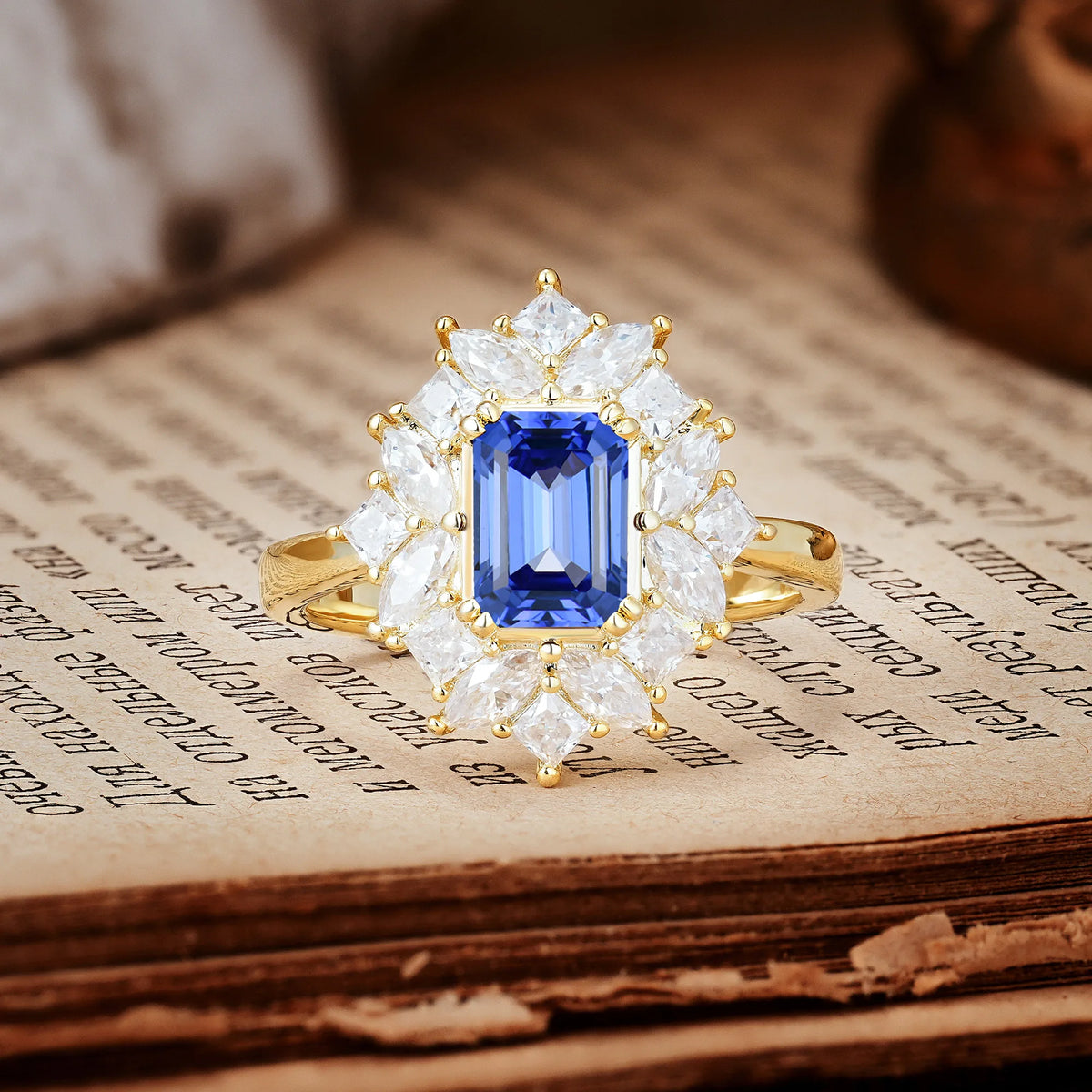 Unique & Classic 12-Prong Emerald Cut Sapphire Engagement Ring