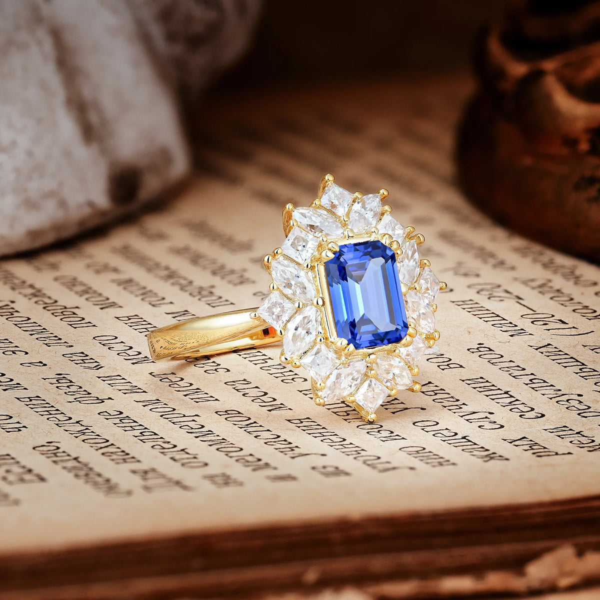 Unique & Classic 12-Prong Emerald Cut Sapphire Engagement Ring