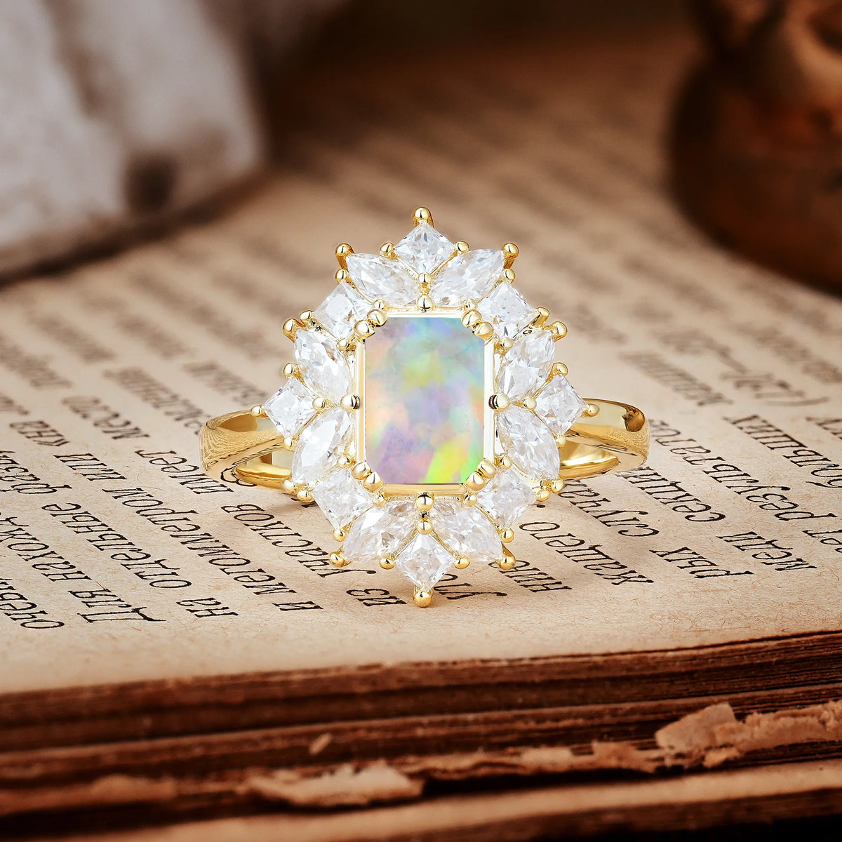 Unique & Classic 12-Prong Emerald Cut Fire Opal Engagement Ring