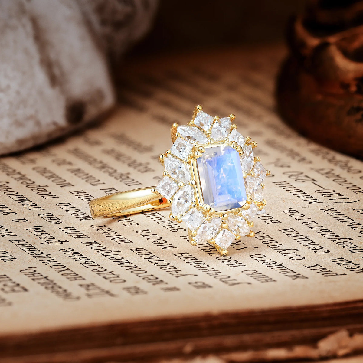Unique & Classic 12-Prong Emerald Cut Moonstone Engagement Ring