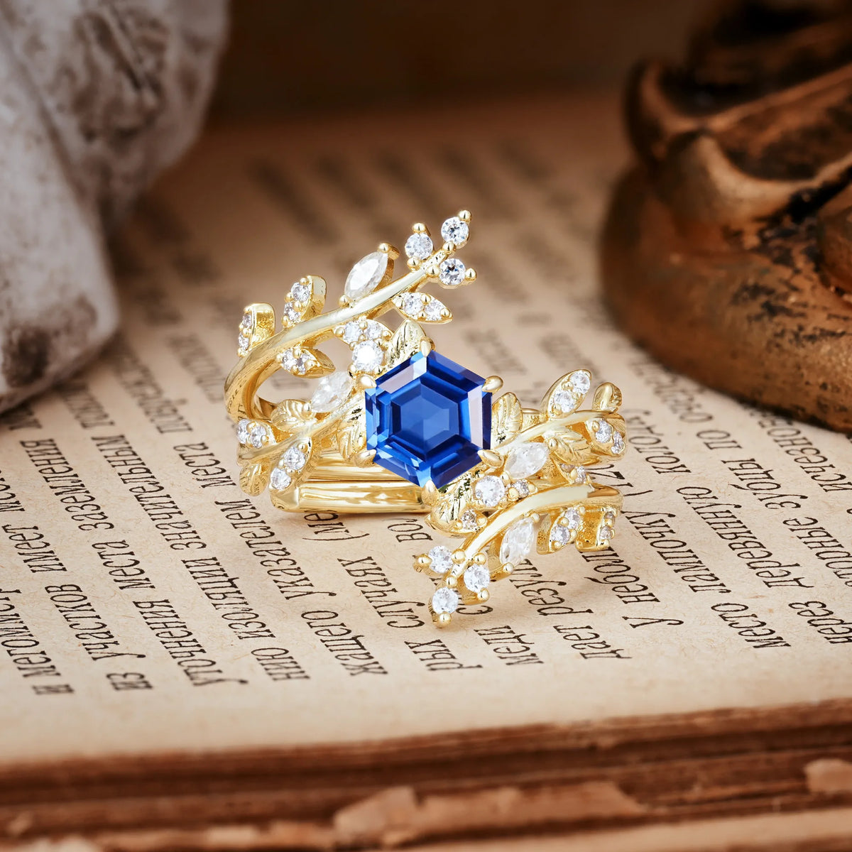 Nature-Inspired Luxury: 6-Prong Hexagonal Cut Sapphire Bridal Ring Set