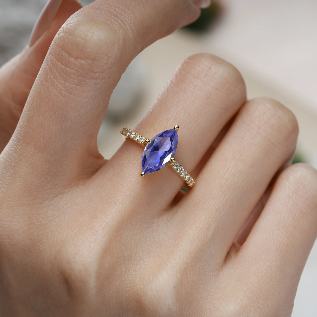 Marquise Cut Tanzanite Solitaire Engagement Ring with Pavé Band