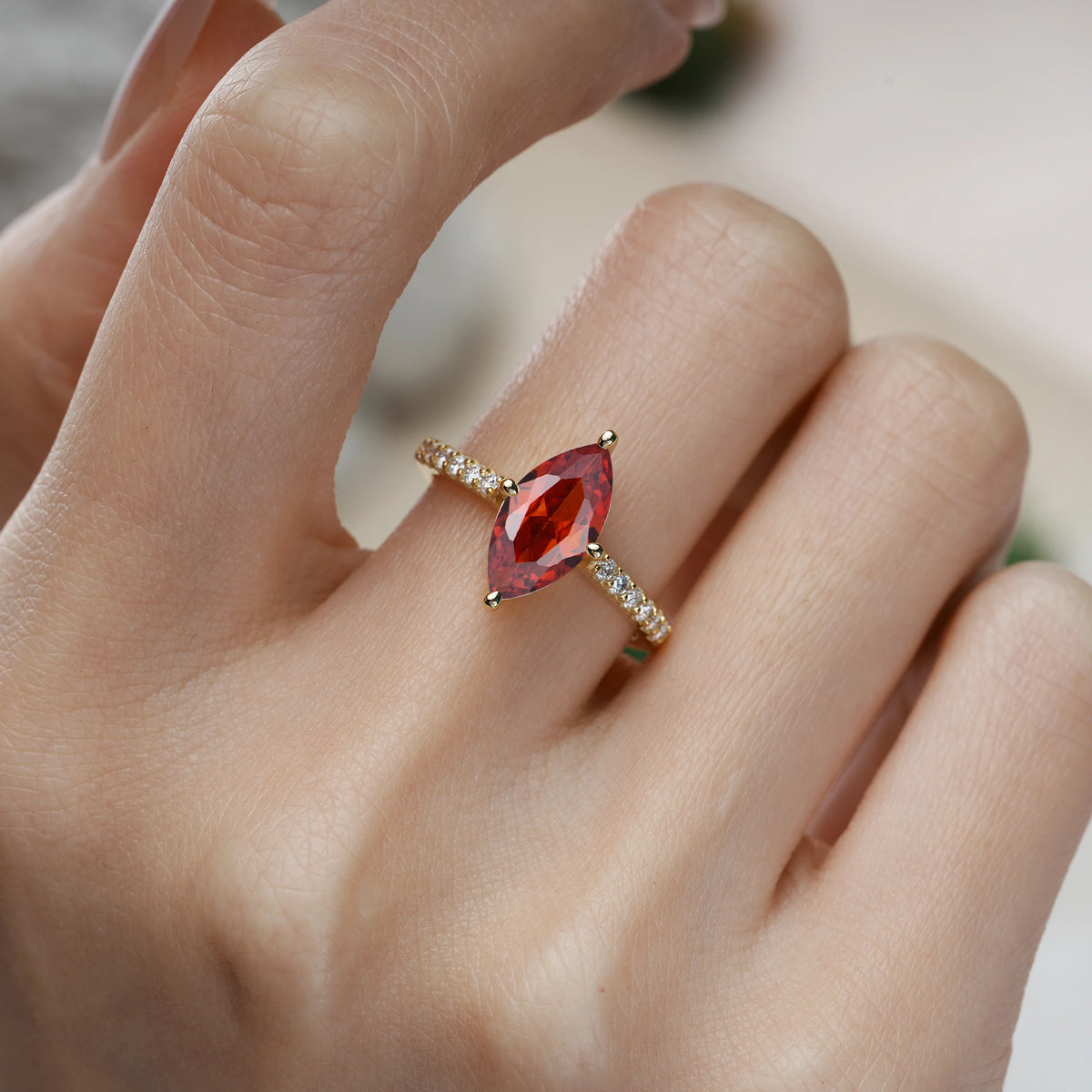 Marquise Cut Garnet Solitaire Engagement Ring with Pavé Band