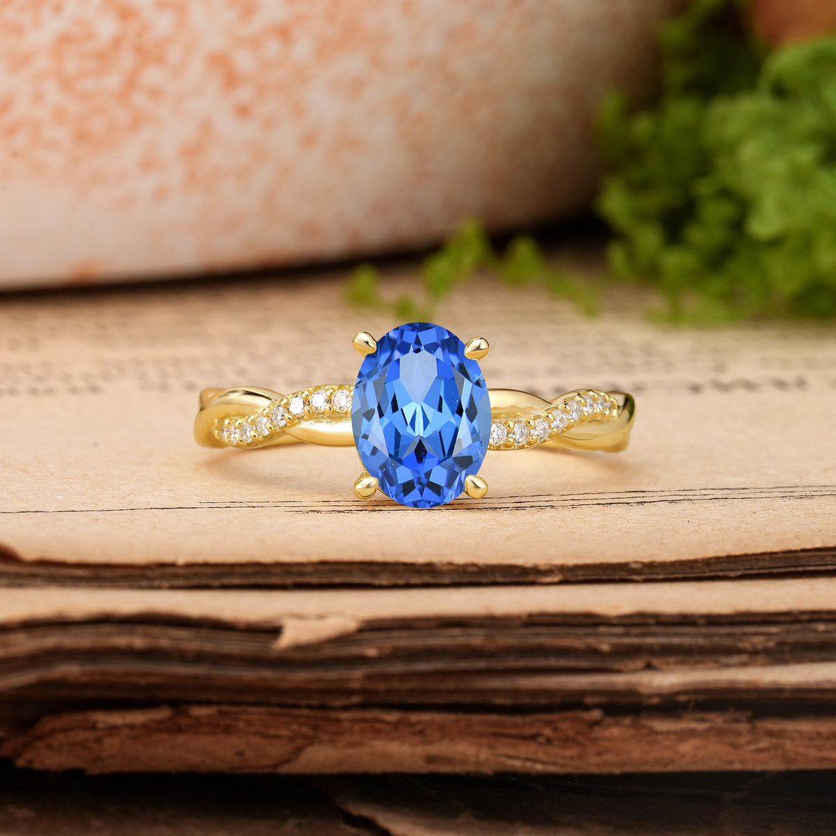 Oval Cut Sapphire Twisted Pavé Engagement Ring