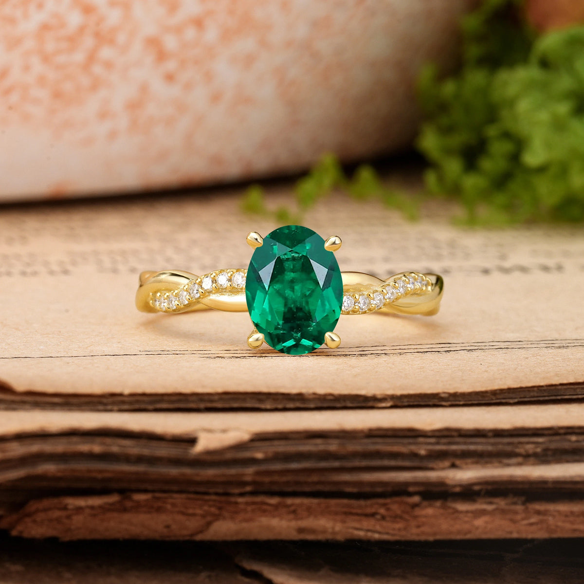 Oval Cut Emerald Twisted Pavé Engagement Ring