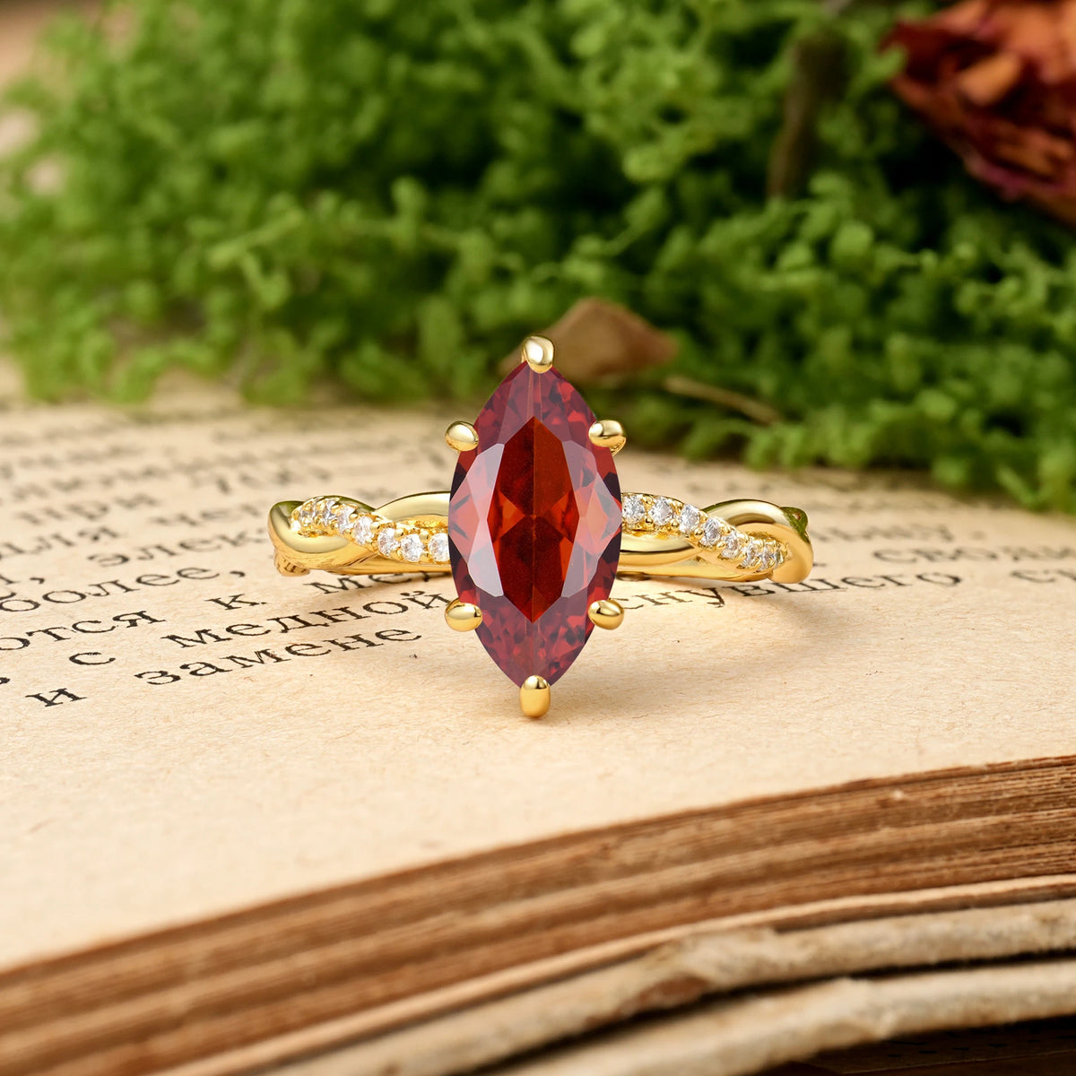 Marquise Cut Garnet Twisted Pavé Engagement Ring