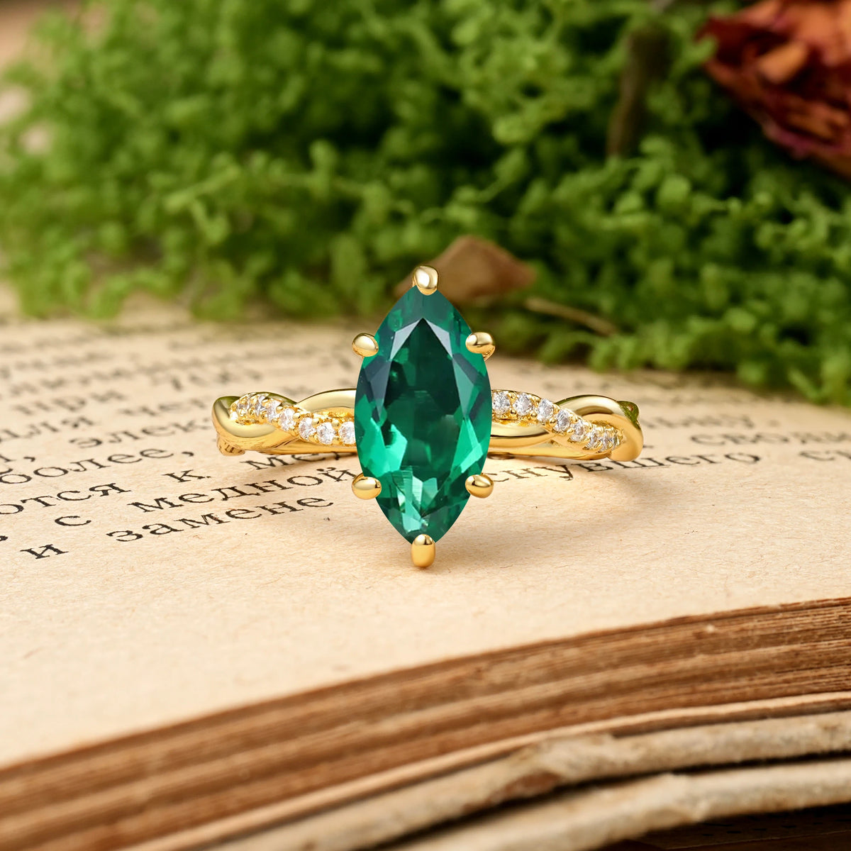 Marquise Cut Emerald Twisted Pavé Engagement Ring