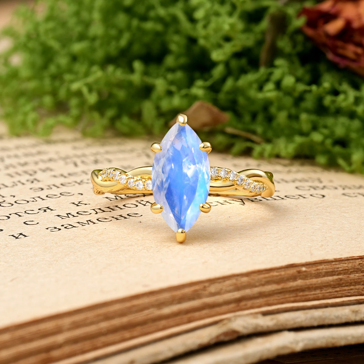 Marquise Cut Moonstone Twisted Pavé Engagement Ring