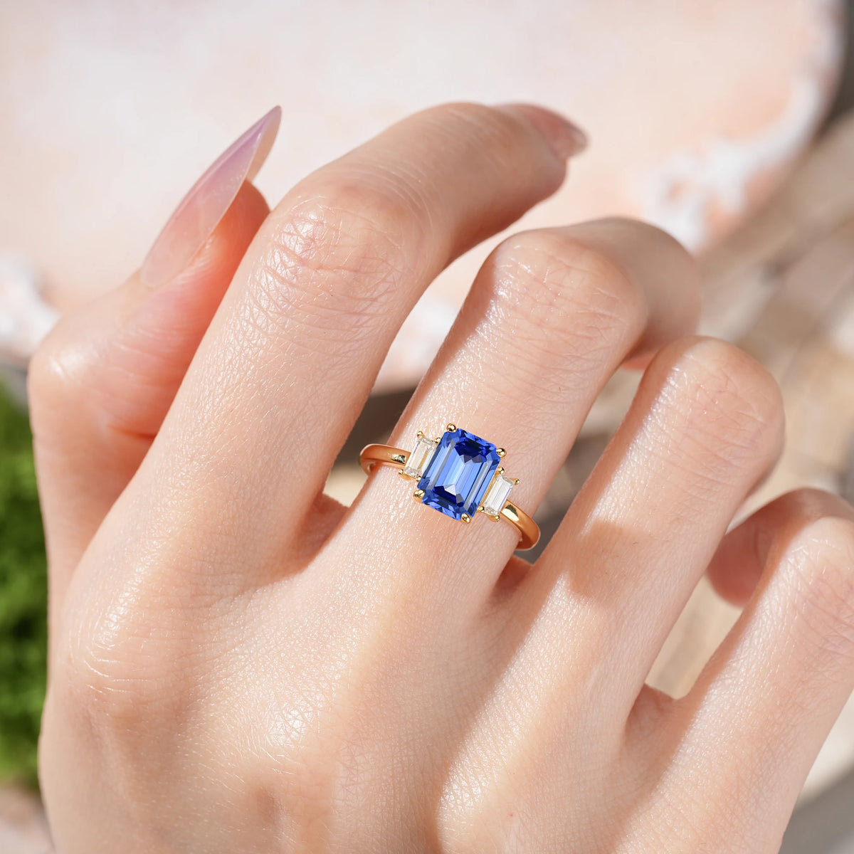 Emerald Cut Sapphire Three Stone Engagement Ring with Trapezoid Side Stones