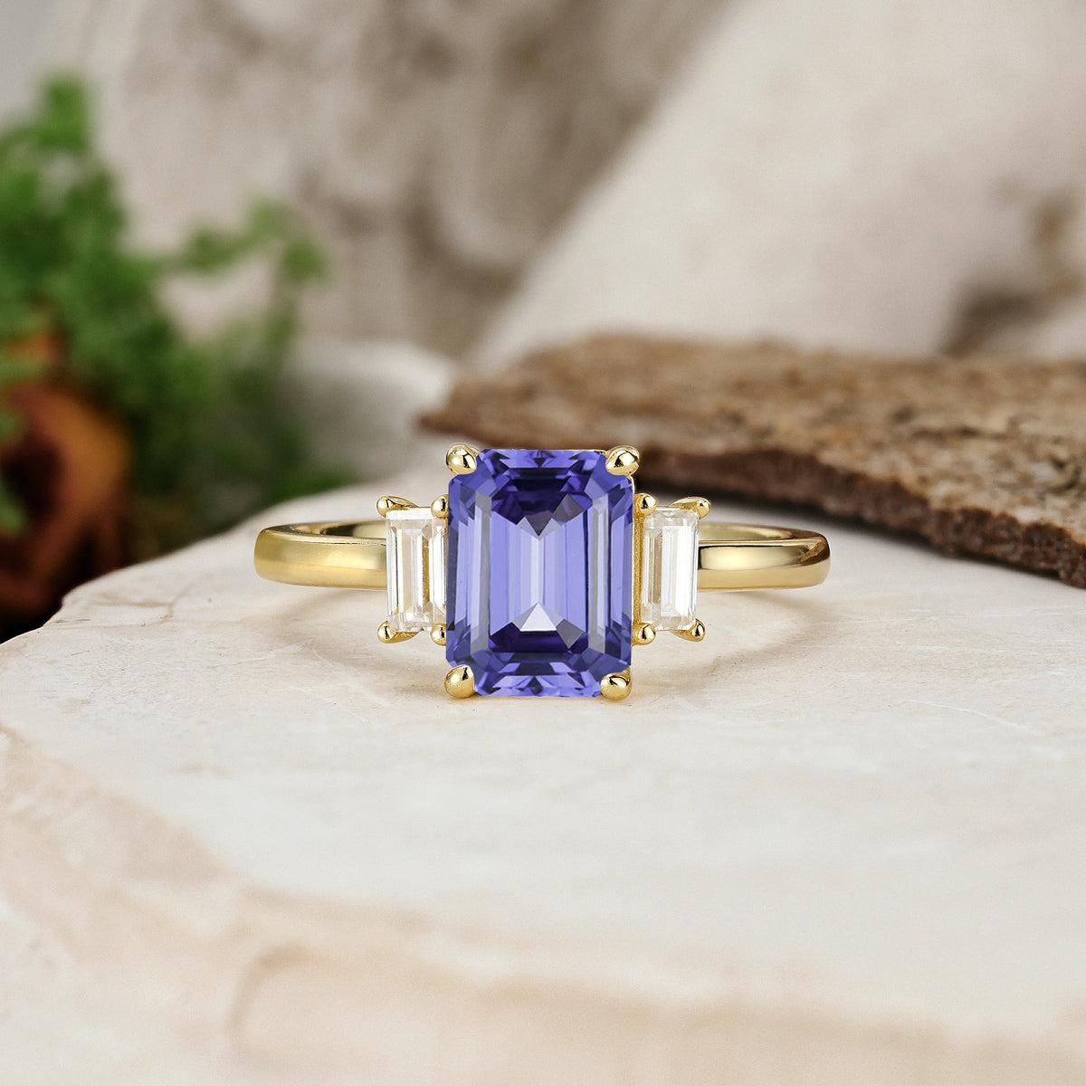 Emerald Cut Tanzanite Three Stone Engagement Ring with Trapezoid Side Stones