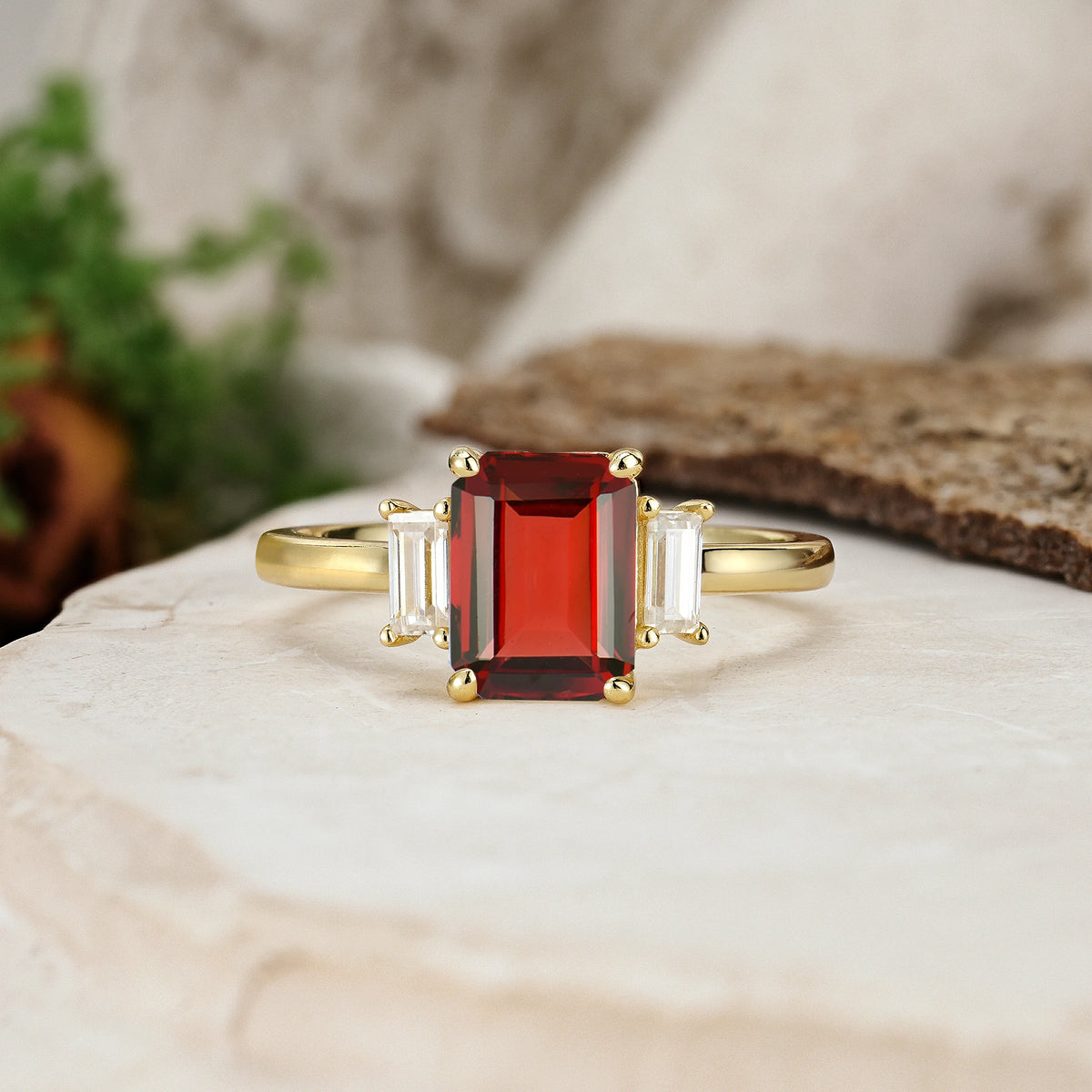 Emerald Cut Garnet Three Stone Engagement Ring with Trapezoid Side Stones