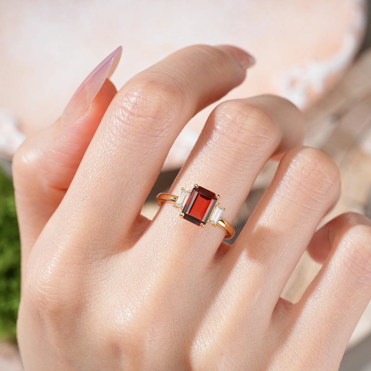 Emerald Cut Garnet Three Stone Engagement Ring with Trapezoid Side Stones