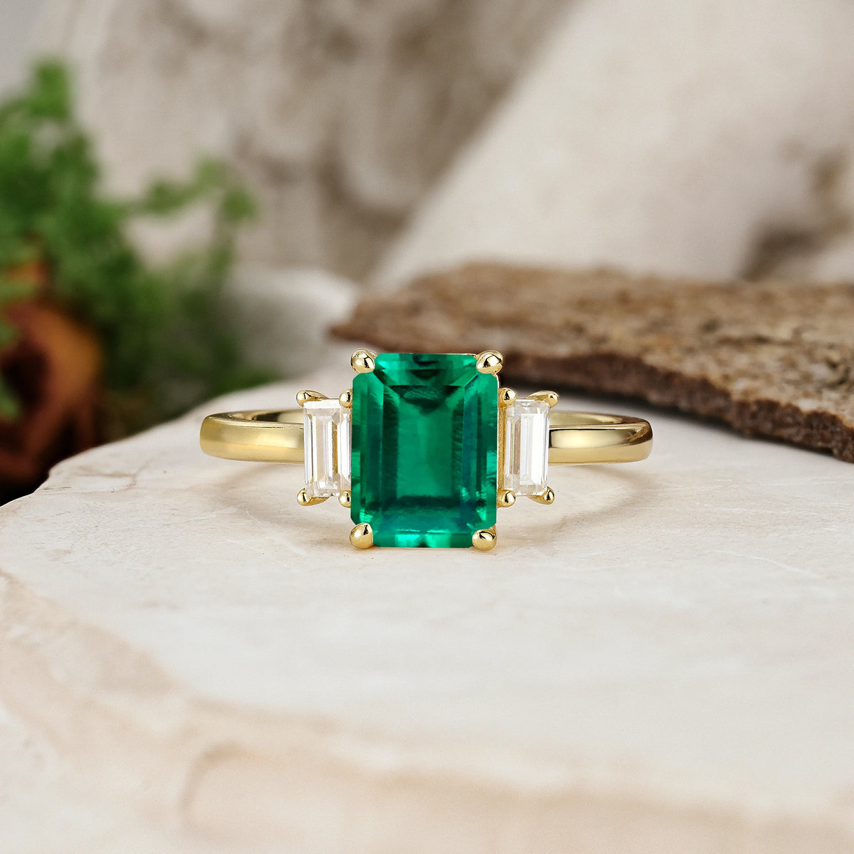 Emerald Cut Emerald Three Stone Engagement Ring with Trapezoid Side Stones