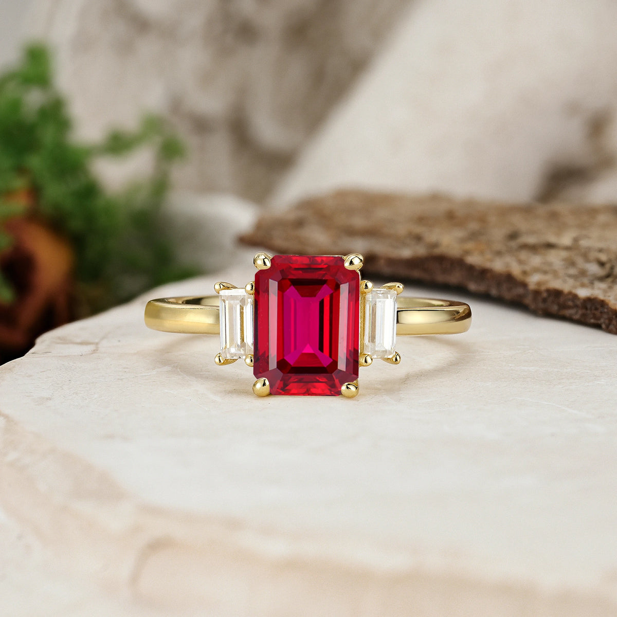 Emerald Cut Ruby Three Stone Engagement Ring with Trapezoid Side Stones