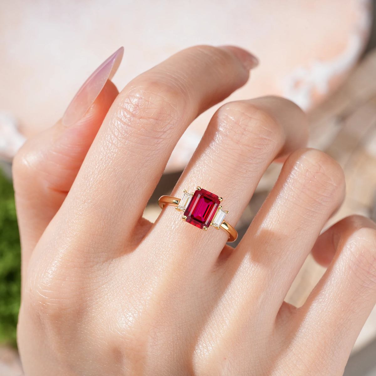 Emerald Cut Ruby Three Stone Engagement Ring with Trapezoid Side Stones