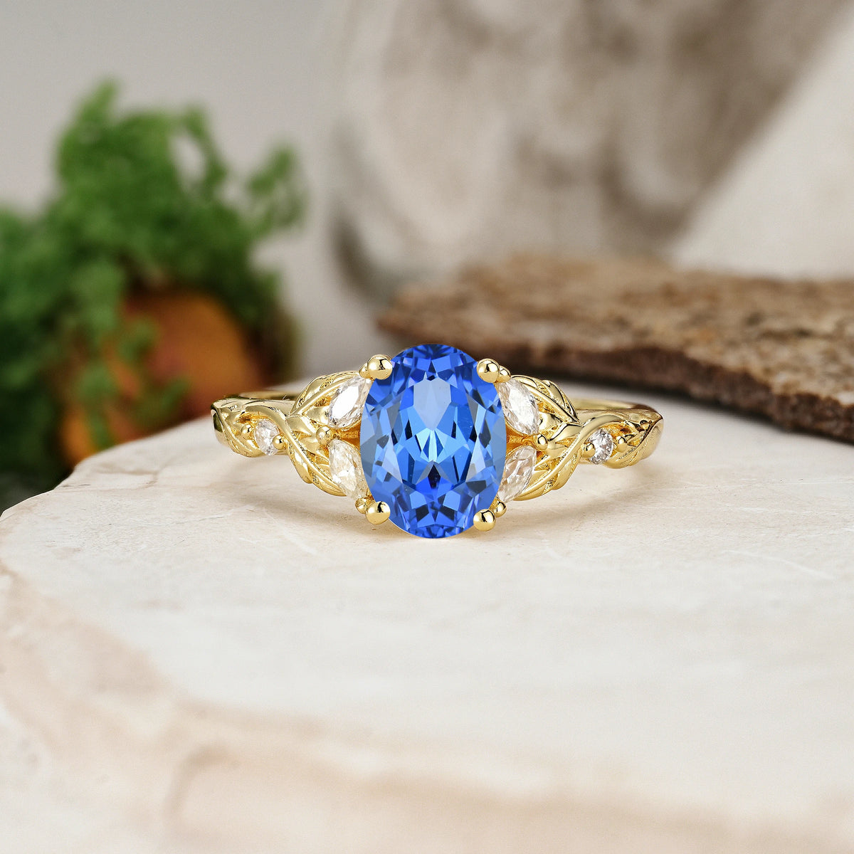 Oval Cut Sapphire Botanical Leaf Vine Engagement Ring with Marquise Side Stones