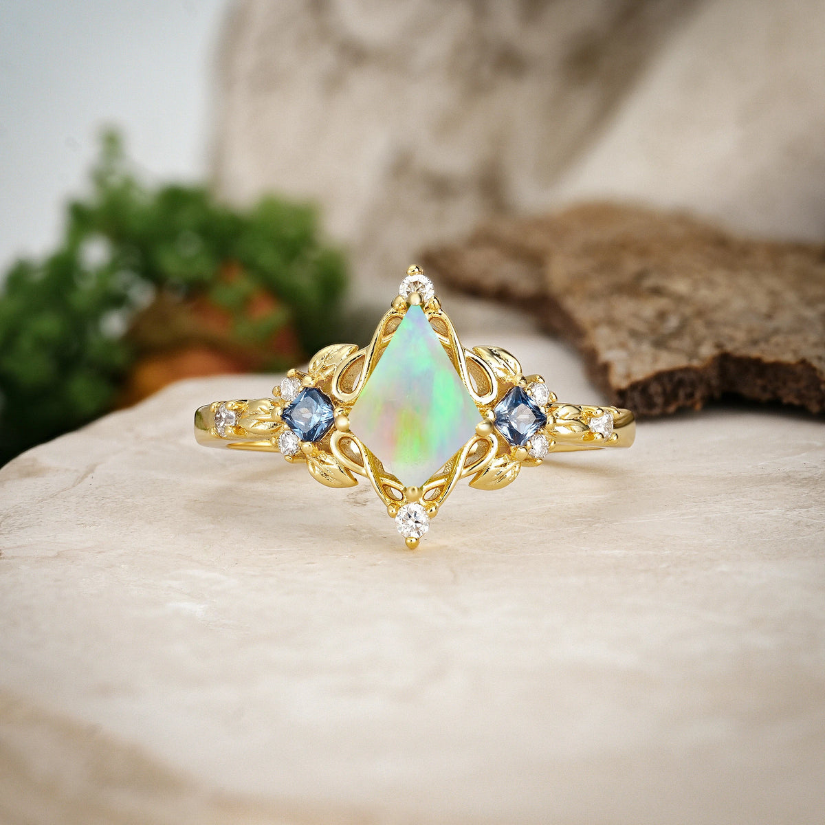 Kite Cut Fire Opal Art Nouveau Leaf Engagement Ring with Princess Side Stones