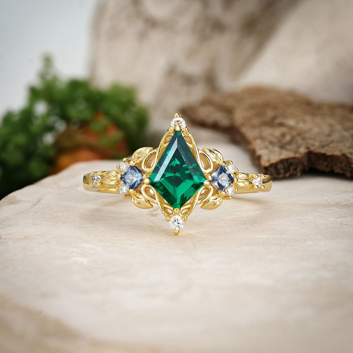 Kite Cut Emerald Art Nouveau Leaf Engagement Ring with Princess Side Stones