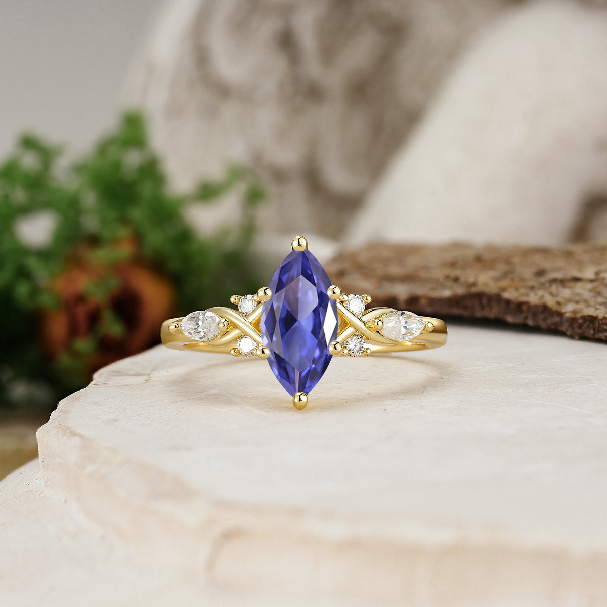 Marquise Cut Tanzanite Twisted Bypass Engagement Ring with Pear Side Stones