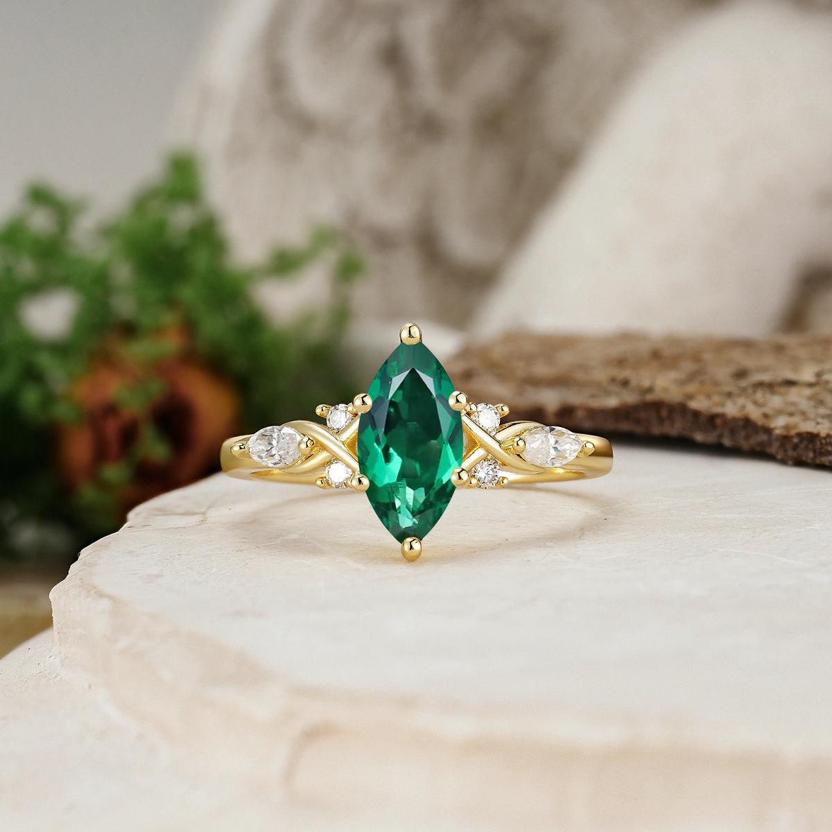 Marquise Cut Emerald Twisted Bypass Engagement Ring with Pear Side Stones