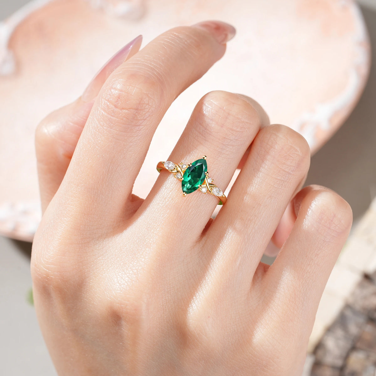 Marquise Cut Emerald Twisted Bypass Engagement Ring with Pear Side Stones