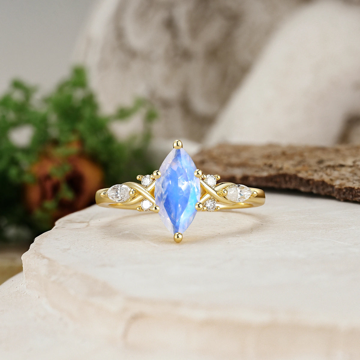 Marquise Cut Moonstone Twisted Bypass Engagement Ring with Pear Side Stones